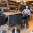 Brian Gorry (standing) and Shane Kirby in their extended kitchen with Minnie.The units are from Kube, and they bought the chairs for a fraction of their usual retail price from a hair salon which was closing down. The builders recycled their old units by fitting them in the outdoor utility room